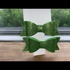 Pair of green hair bows